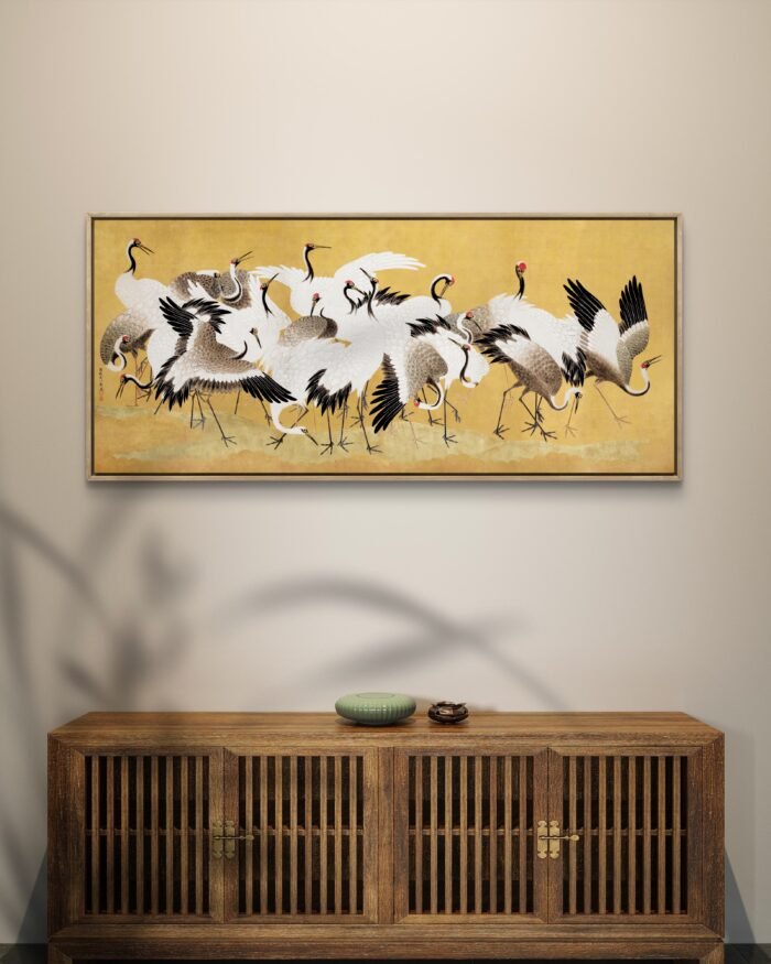 an elegant traditional-style painting of a group of cranes set against a warm golden background